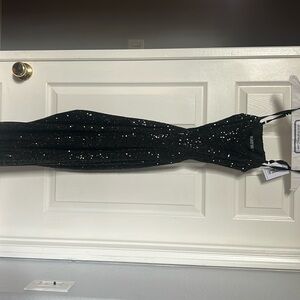 Brand new jumpsuit from Katie J with tags still attached never worn